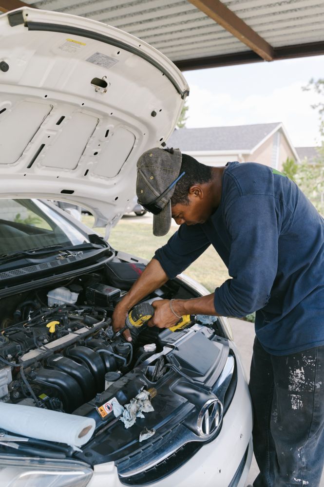 Mobile oil change service at a Ventura home